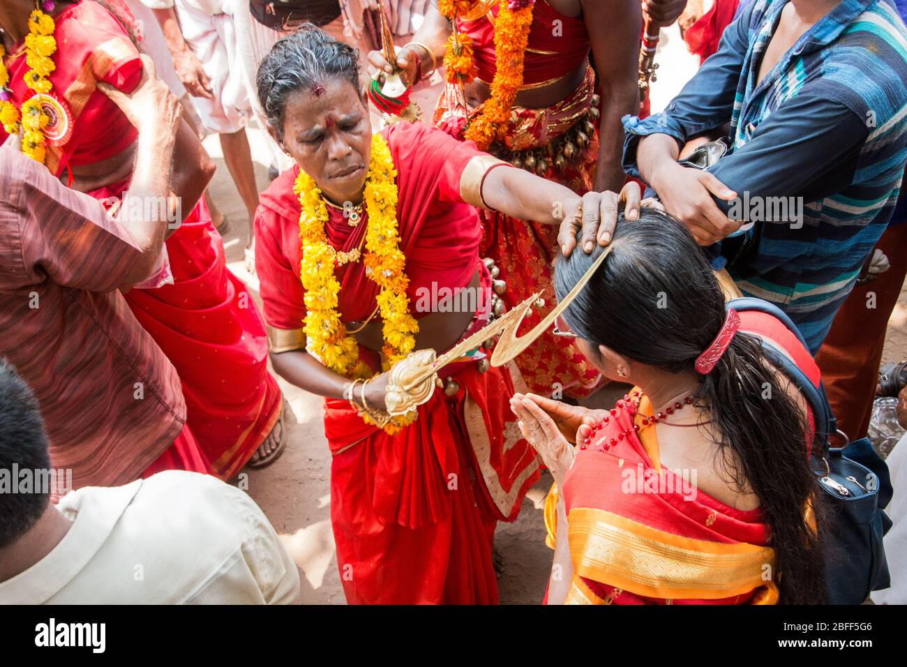 devotees in red dress and sickleshaped swords at sree kurumba sree kurumba bhagavati temple kodungallur during bharani festival thrissur kerala india stock photo alamy https www alamy com devotees in red dress and sickleshaped swords at sree kurumba sree kurumba bhagavati temple kodungallurduring bharani festivalthrissurkeralaindia image353760854 html