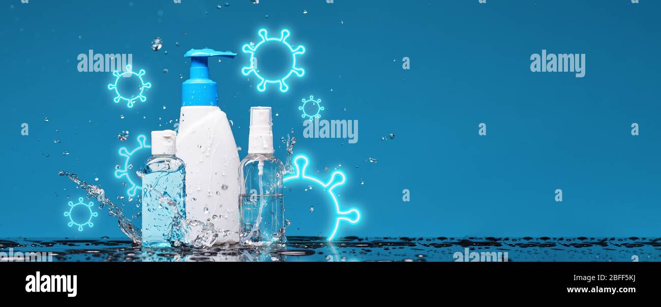 Bottle of antiseptic liquid soap, spray and gel in splashes of water. Concept of washing hand, hygiene and prevention measures from the Covid-19 Coron Stock Photo