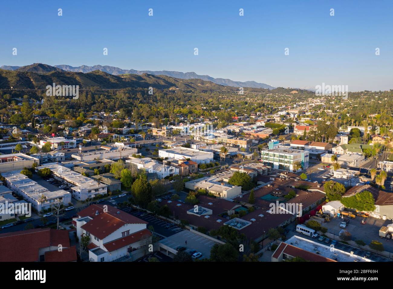 Aerial views above the Eagle Rock neighborhood in northeast Los Angeles at sunset Stock Photo