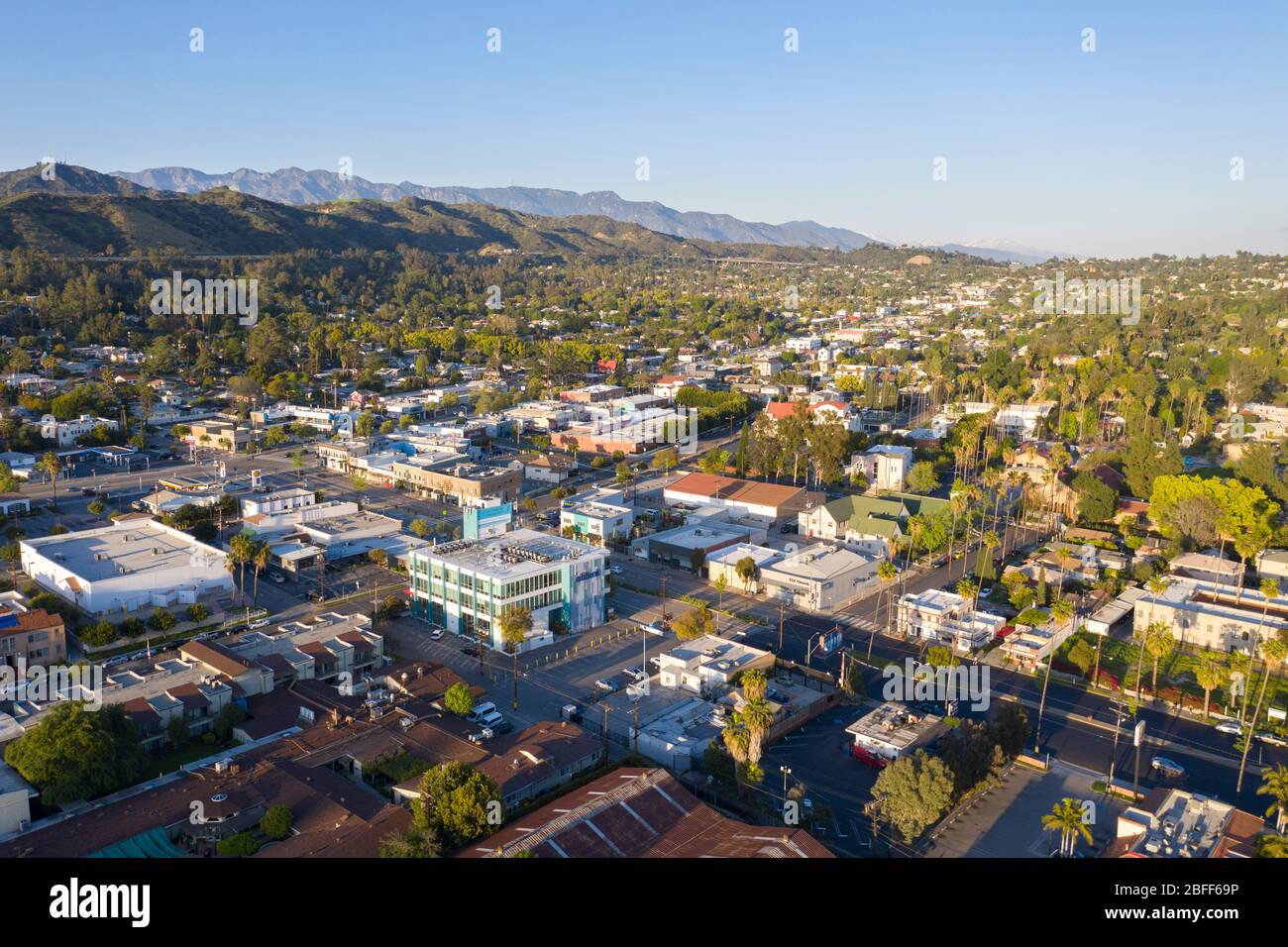 Aerial views above the Eagle Rock neighborhood in northeast Los Angeles at sunset Stock Photo