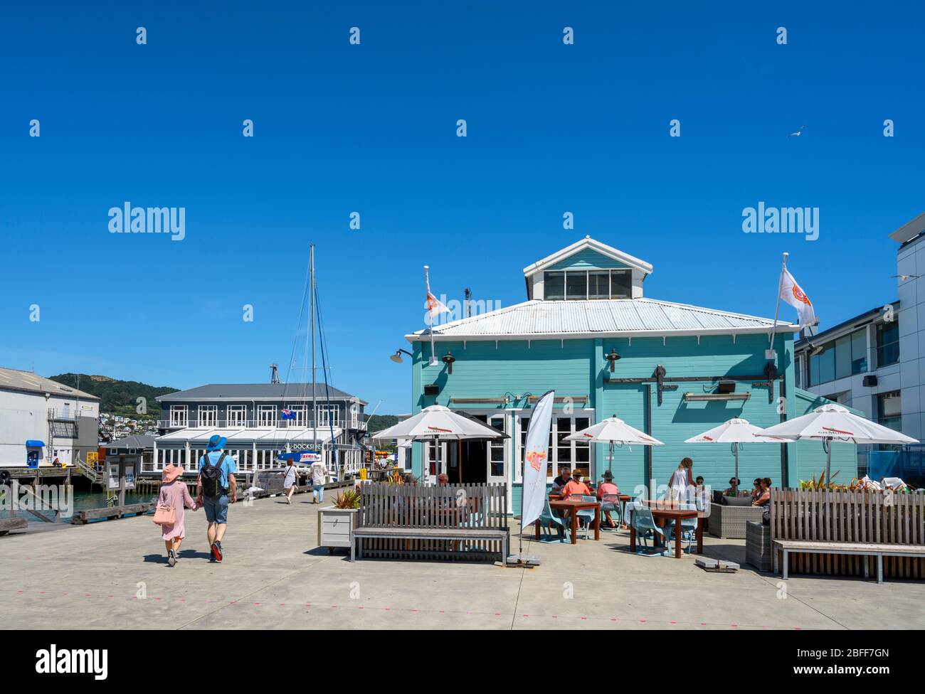 Restaurant / bar on the seafront promenade at Queens Wharf, Wellington, New Zealand Stock Photo