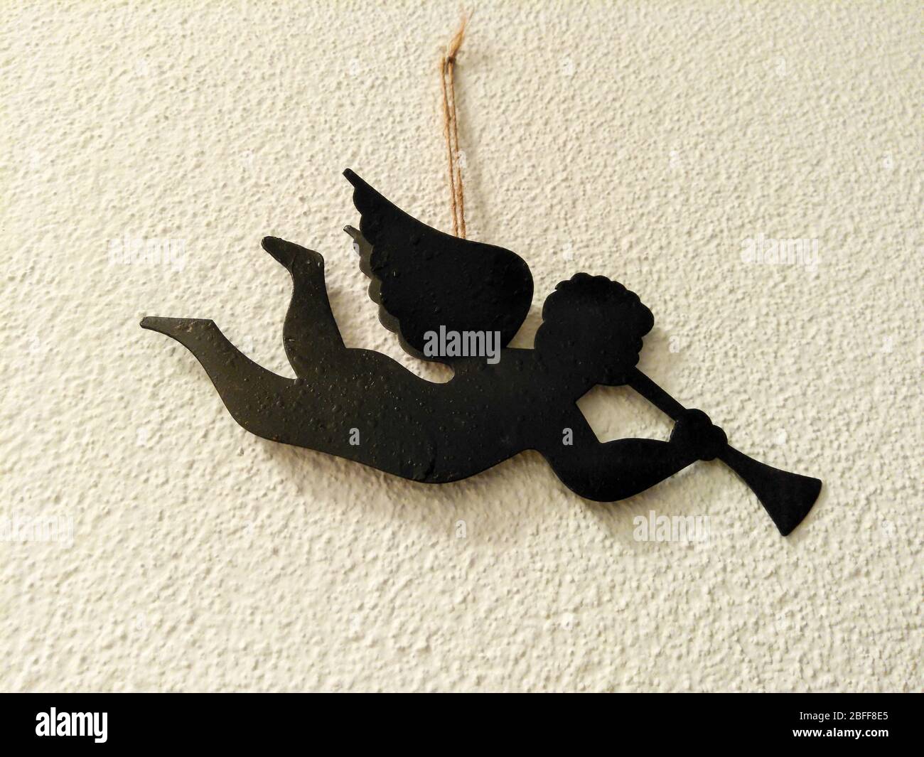 Ornamental pendant hanging on the wall Stock Photo