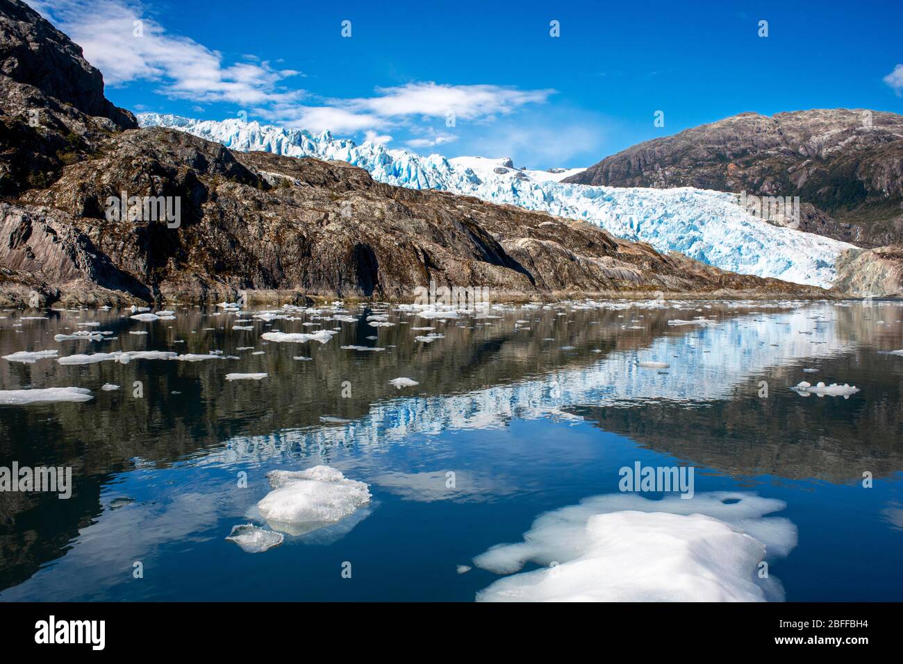 El Brujo Glacier On The Edge Of The Sarmiento Channel in Bernardo O'Higgins National Park in Patagonia Chile fjords near Puerto Natales, Chile Stock Photo