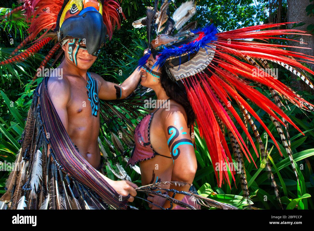 Mexican aztec dress gods at Grand Palladium White Sand Resort and Spa in Riviera Maya, Yucatan Peninsula, Quintana Roo, Caribbean Coast, Mexico.   Azt Stock Photo