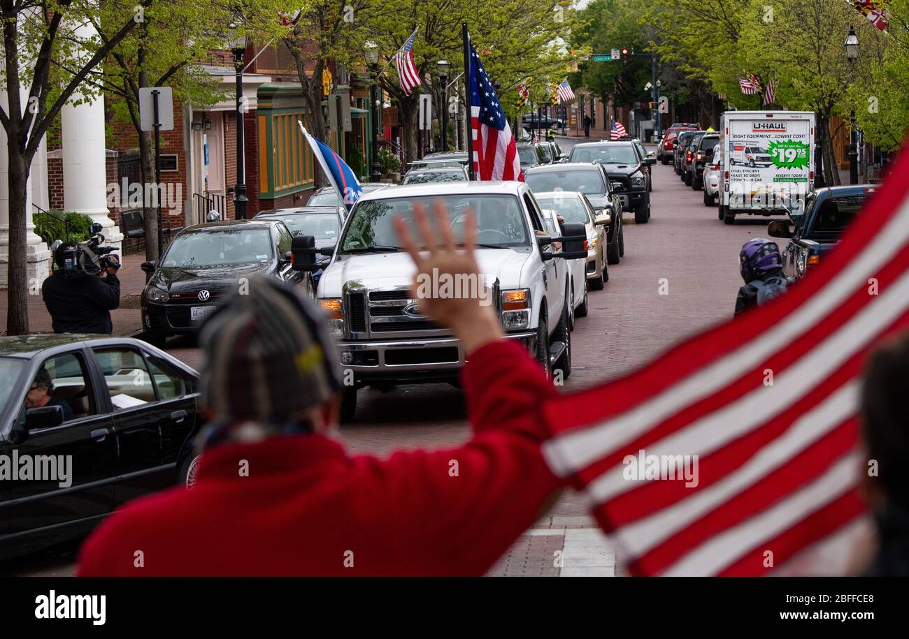 Annapolis, United States. 18th Apr, 2020. Drivers in vehicles line up during a protest to reopen Maryland and end the stay at home order imposed during the Coronavirus COVID-19 pandemic, near the state capitol building in Annapolis, Maryland on Saturday, April 18, 2020. Drivers circled Annapolis hoking their horns and calling for Gov. Larry Hogan (R-MD) to end the stay at home order. Photo by Kevin Dietsch/UPI Credit: UPI/Alamy Live News Stock Photo