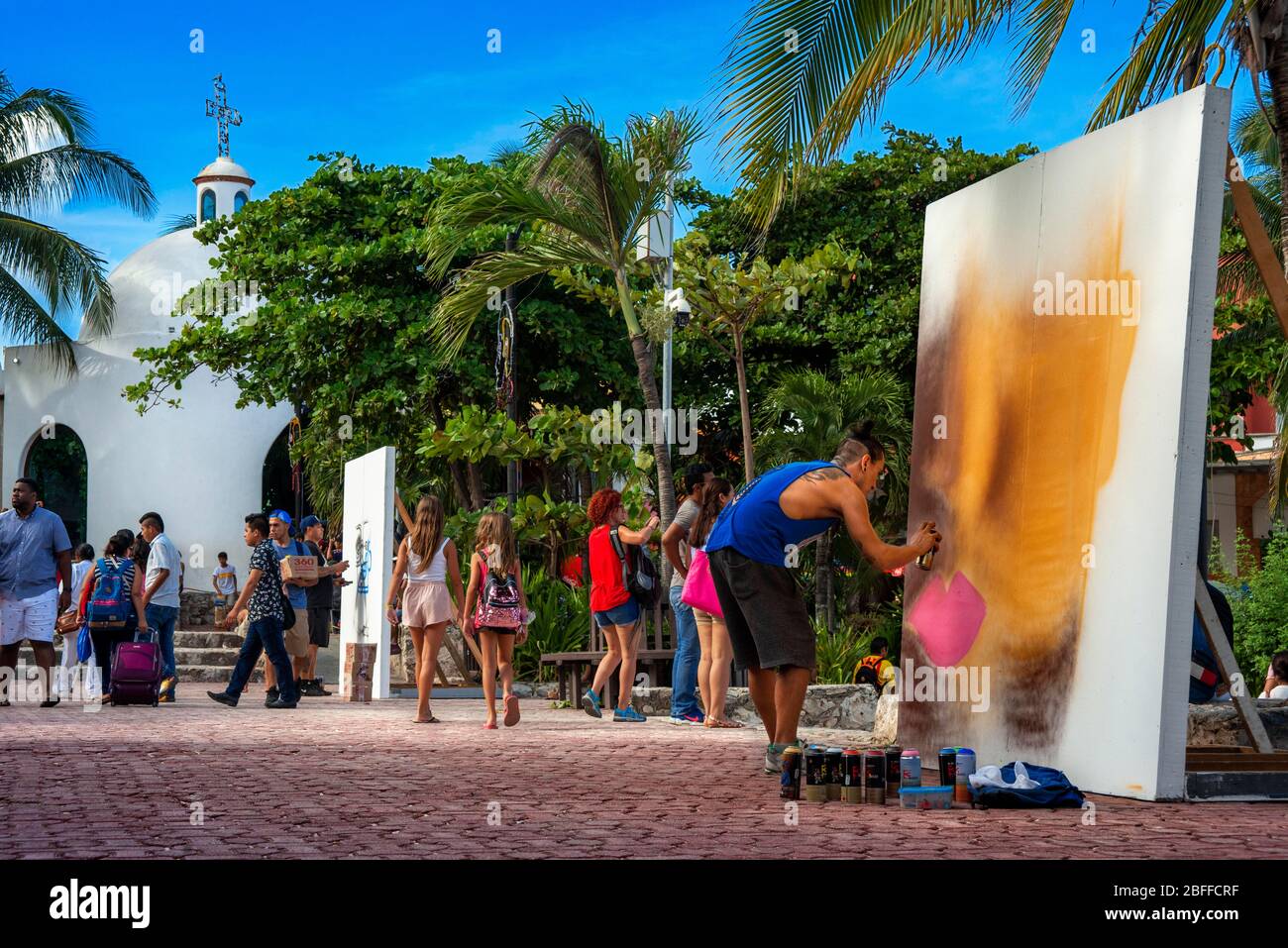 White Mexican church and street art at 5th Avenue, Playa del Carmen, Caribe, Quintana Roo state, Mayan Riviera, Yucatan Peninsula, Mexico Stock Photo