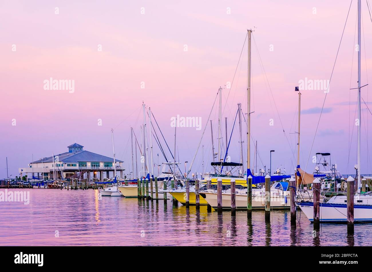 Yachts, sailboats, and pleasure boats are docked in Pass Christian