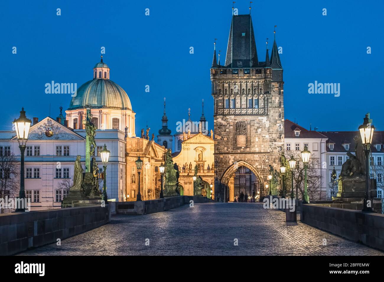 Charles bridge during dusk - empty due to coronavirus pandemic, Prague, Czech Republic Stock Photo