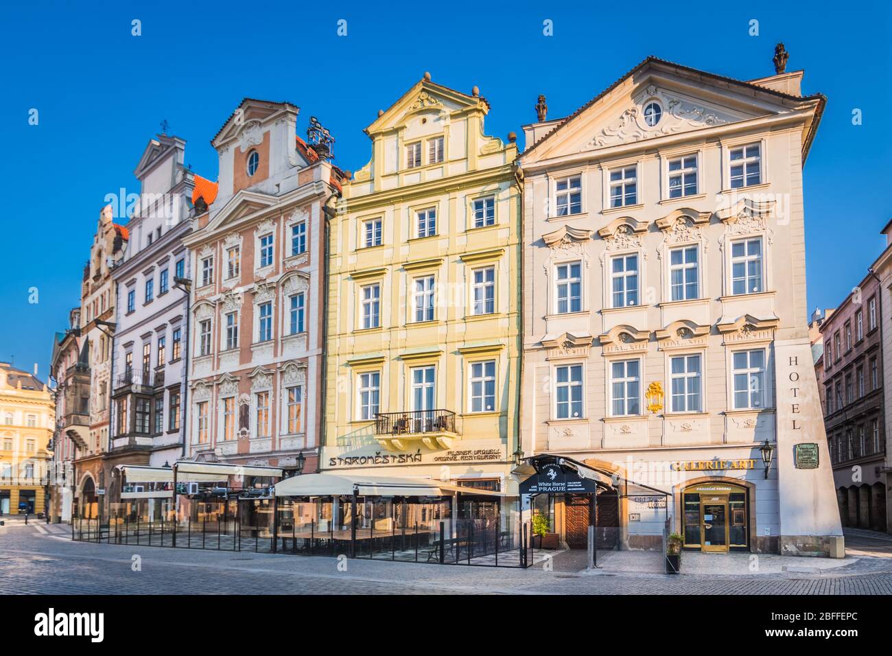 Walking on the empty, deserted streets with closed shops in Prague city center during coronavirus outbreak, Czech Republic Stock Photo