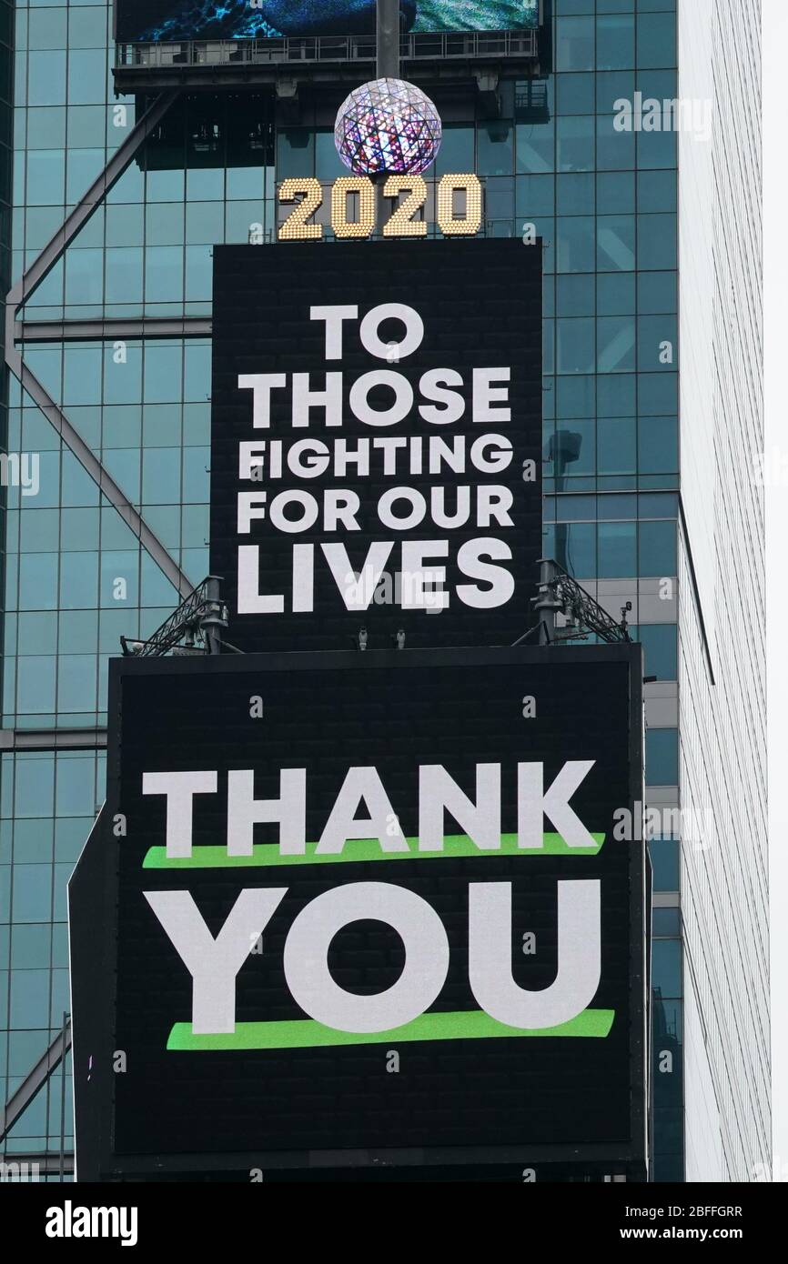 New York, NY, USA. 18th Apr, 2020. Thank You signs flash on billboards in a nearly deserted Times Square during the COVID-19 pandemic on April 18, 2020 in New York. Credit: Bryan Smith/ZUMA Wire/Alamy Live News Stock Photo