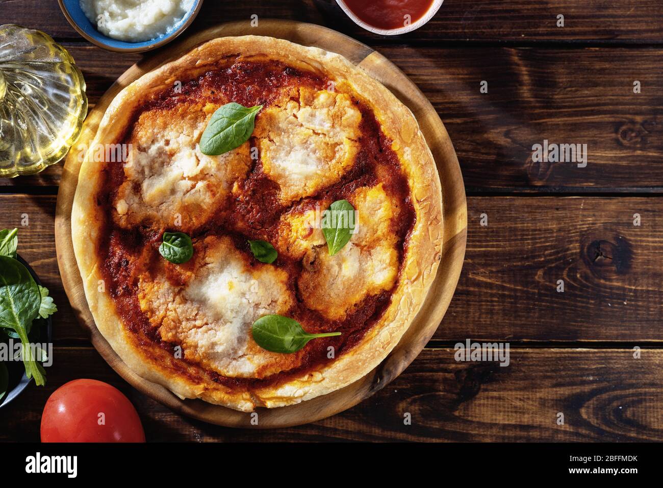 Close up of vegan pizza margherita with cauliflower creamy cheese Stock Photo