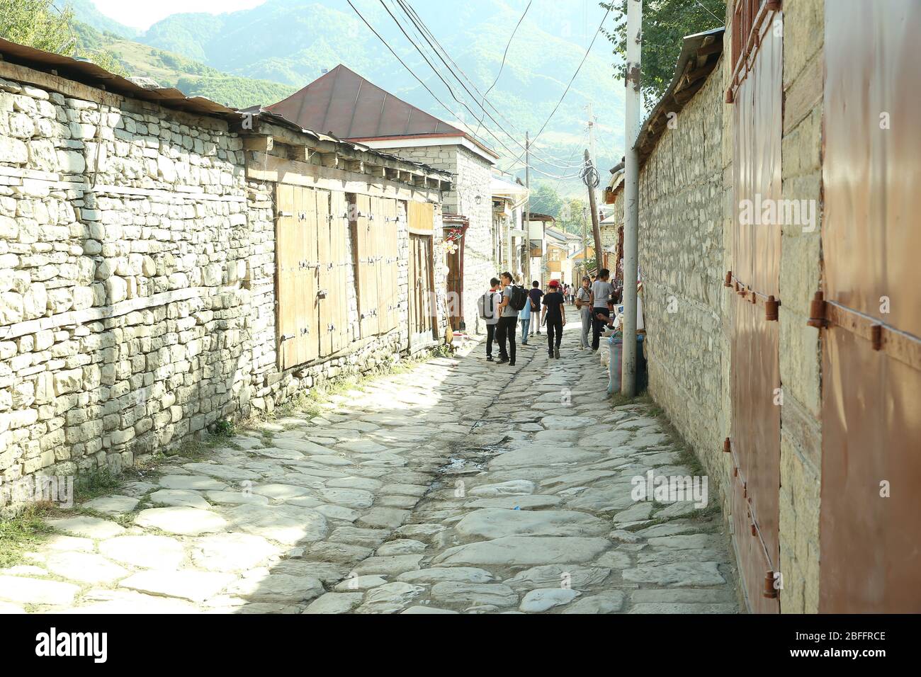 Main central street of Lahij - a town in the historic buildings . Lahic