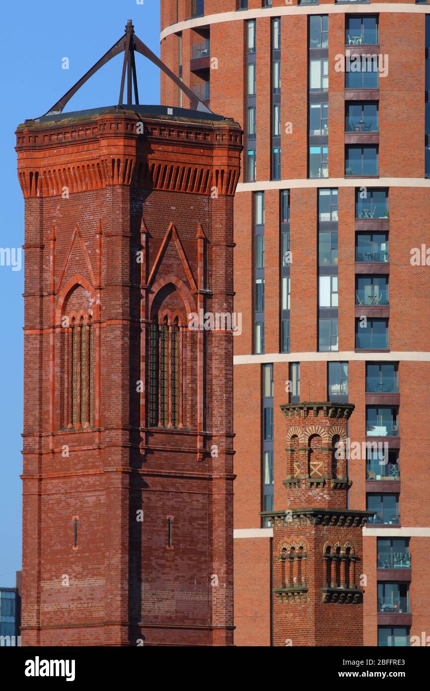 Candle House apartments in Leeds with listed structures of Tower Works at Holbeck Urban Village Stock Photo