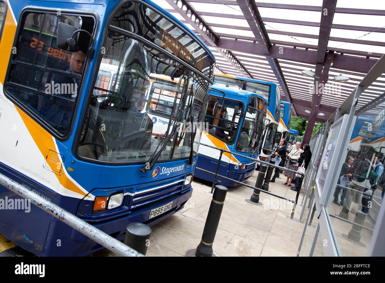Stagecoach Buses and passengers at a bus station, Cambridge Stock Photo ...
