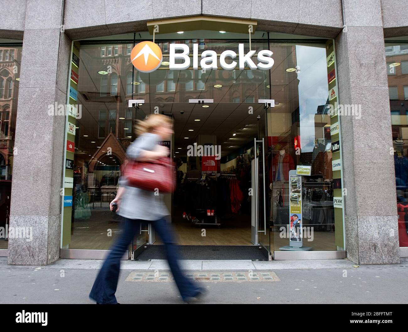 A person passes in front of a branch of Blacks Leisure Group, London. 28/05/09 Stock Photo