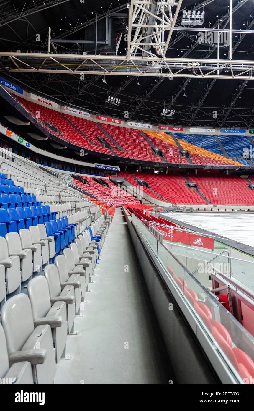 Interior view of Johan Cruyff Arena during off-season with the playing field covered by metallic sheets in preparation for a concert in Amsterdam Stock Photo