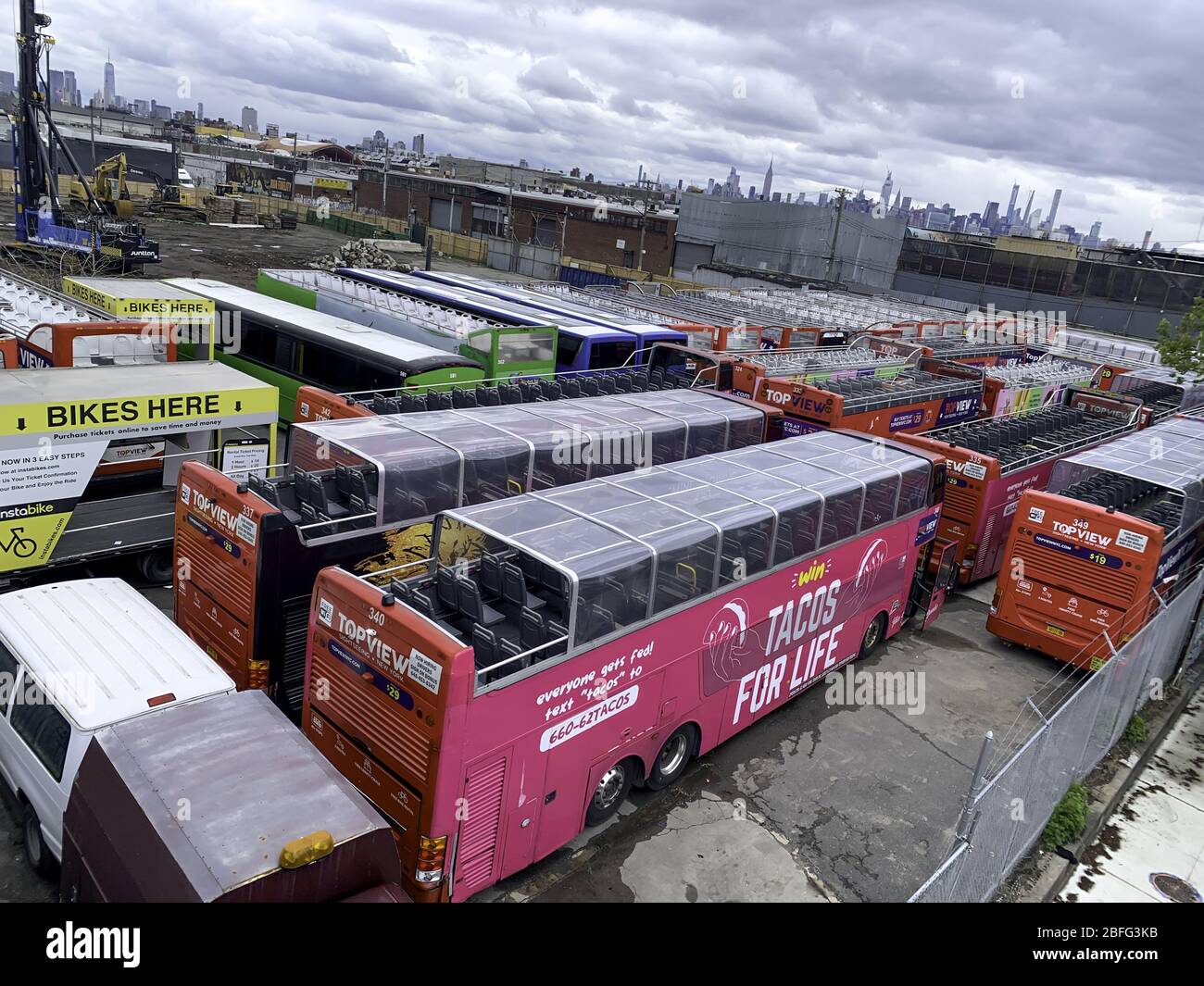 Brooklyn, USA. 18th Apr, 2020. (NEW) Empty streets and parked tour buses amid Covid-19. April 18, 2020, Brooklyn, New York, USA:Some streets remain empty in brooklyn and some tour buses parked because of the pandemic of covid-19 that hit the city this Saturday. And New York governor Andrew Cuomo further prolonged isolation and stay at home order until May 15.Credit: Niyi Fote /Thenews2 Credit: Niyi Fote/TheNEWS2/ZUMA Wire/Alamy Live News Stock Photo