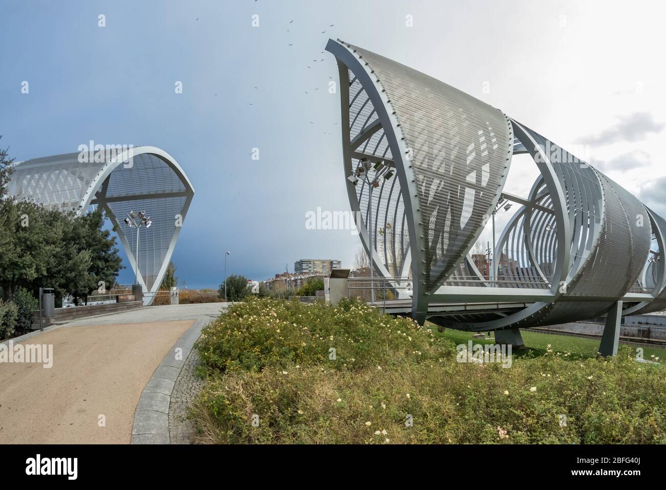 MADRID, SPAIN - DECEMBER 13, 2018: The Arganzuela bridge over Manzanares River downtown Madrid, Spain. It is a futuristic structure built in 2011. Stock Photo
