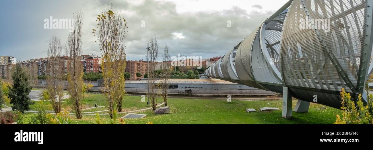 MADRID, SPAIN - DECEMBER 13, 2018: The Arganzuela bridge over Manzanares River downtown Madrid, Spain. It is a futuristic structure built in 2011. Sup Stock Photo