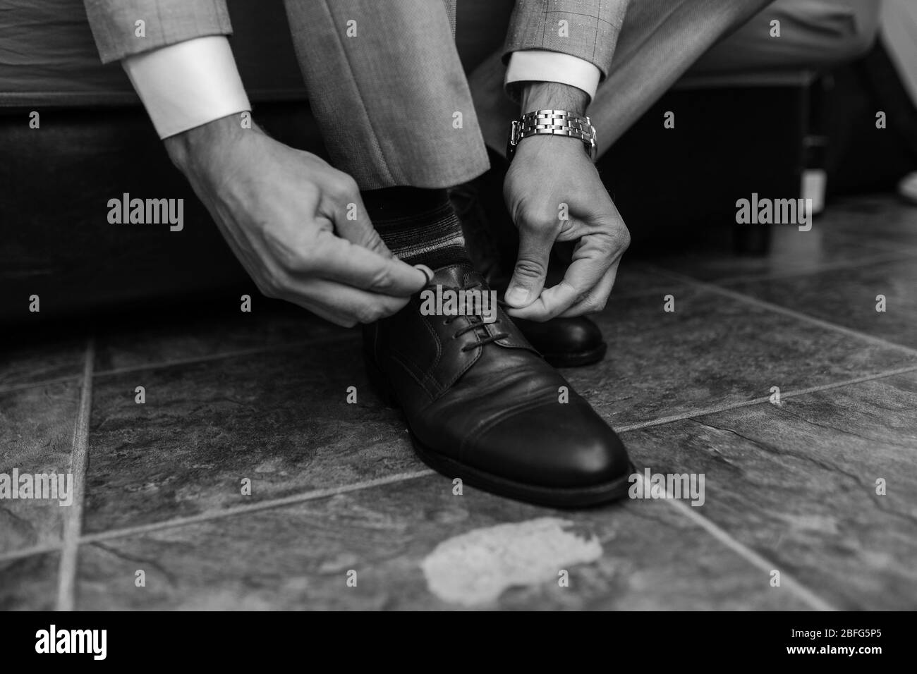 Businessman preparing for business. Suit and fashion Stock Photo