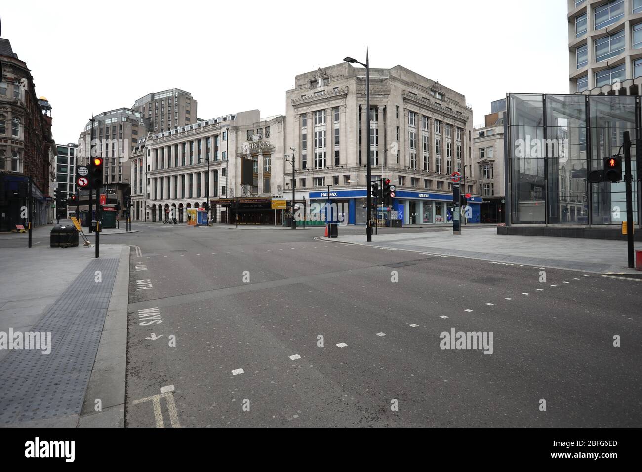 London, UK. 18th Apr, 2020. Day Twenty Six of Lockdown in London. A deserted Tottenham Court Road as the country is on lockdown due to the COVID-19 Coronavirus pandemic. People are not allowed to leave home except for minimal food shopping, medical treatment, exercise - once a day, and essential work. COVID-19 Coronavirus lockdown, London, UK, on April 18, 2020 Credit: Paul Marriott/Alamy Live News Stock Photo