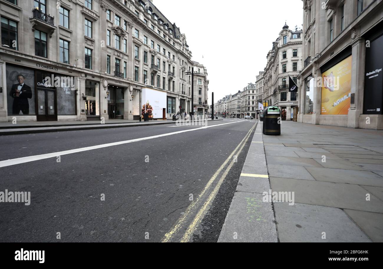 London, UK. 18th Apr, 2020. Day Twenty Six of Lockdown in London. Regent Street is deserted at 10.45am on a very quiet central London for a Saturday as the country is on lockdown due to the COVID-19 Coronavirus pandemic. People are not allowed to leave home except for minimal food shopping, medical treatment, exercise - once a day, and essential work. COVID-19 Coronavirus lockdown, London, UK, on April 18, 2020 Credit: Paul Marriott/Alamy Live News Stock Photo