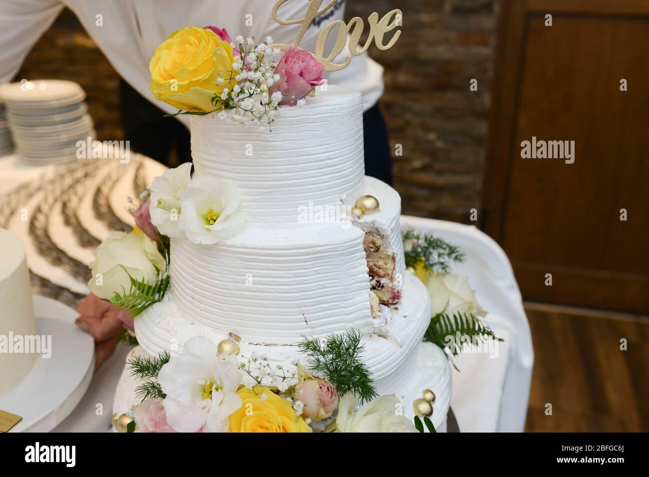 A beautiful big cake for a special event. Sweet table for special ...