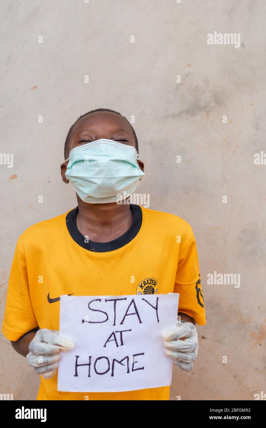 Chilren Wearing Facemask in Africa Pandemic outbreak of Conora virus AKA Covid19 Stock Photo