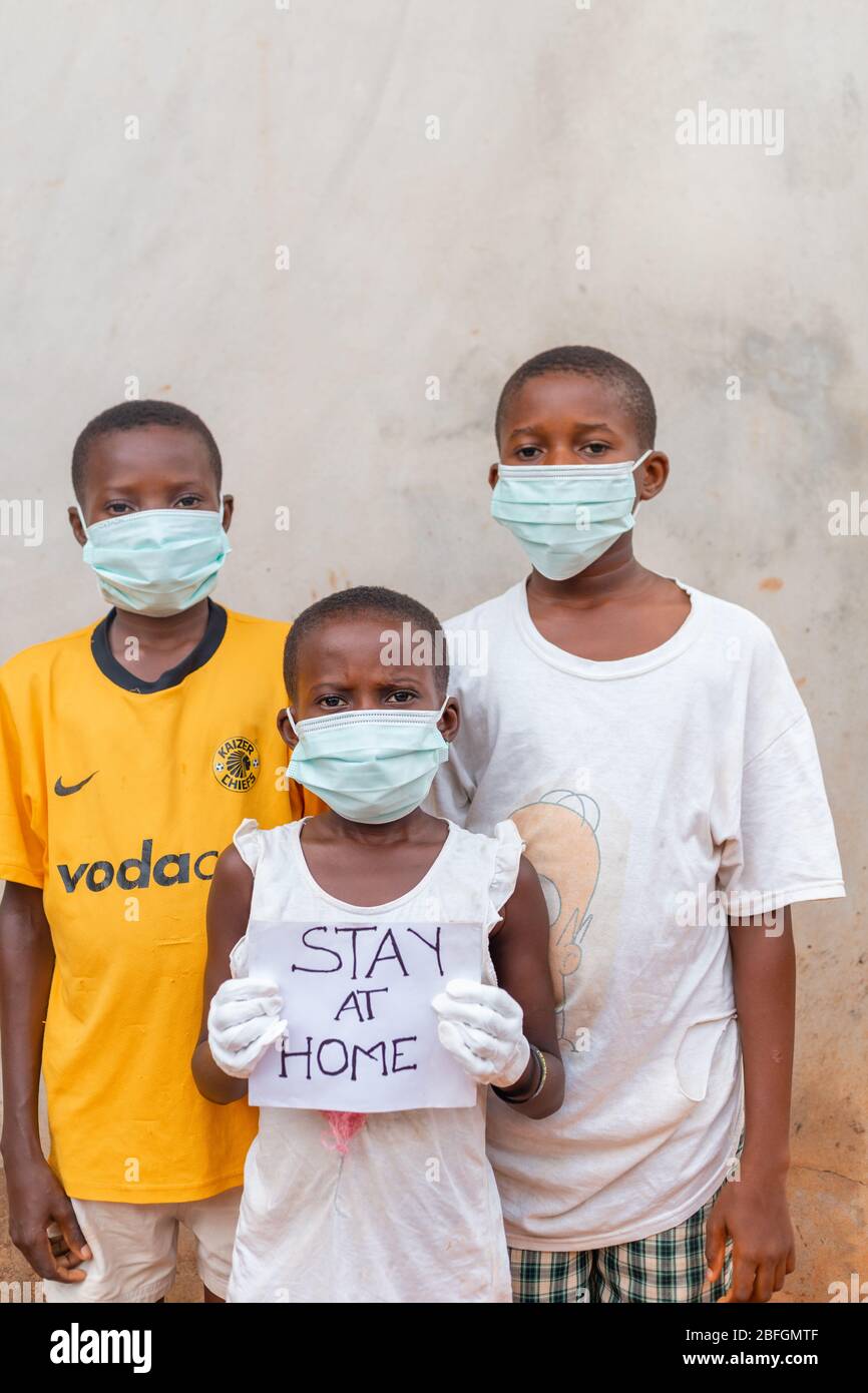 Chilren Wearing Facemask in Africa Pandemic outbreak of Conora virus AKA Covid19 Stock Photo