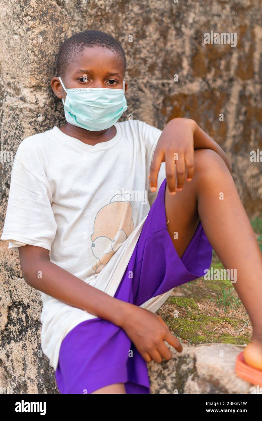 Chilren Wearing Facemask in Africa Pandemic outbreak of Conora virus AKA Covid19 Stock Photo