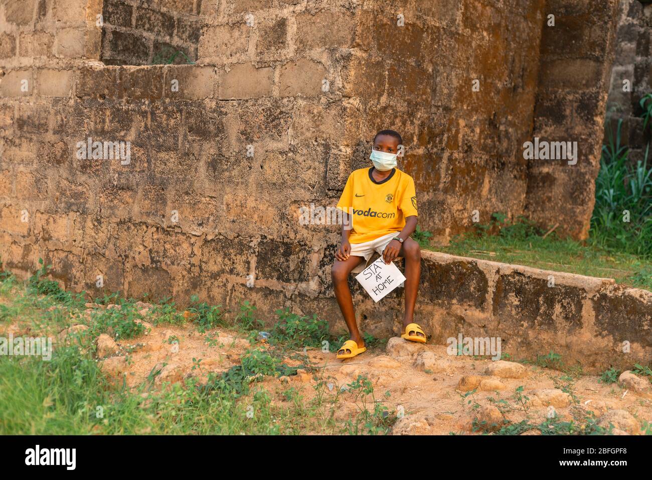 Chilren Wearing Facemask in Africa Pandemic outbreak of Conora virus AKA Covid19 Stock Photo