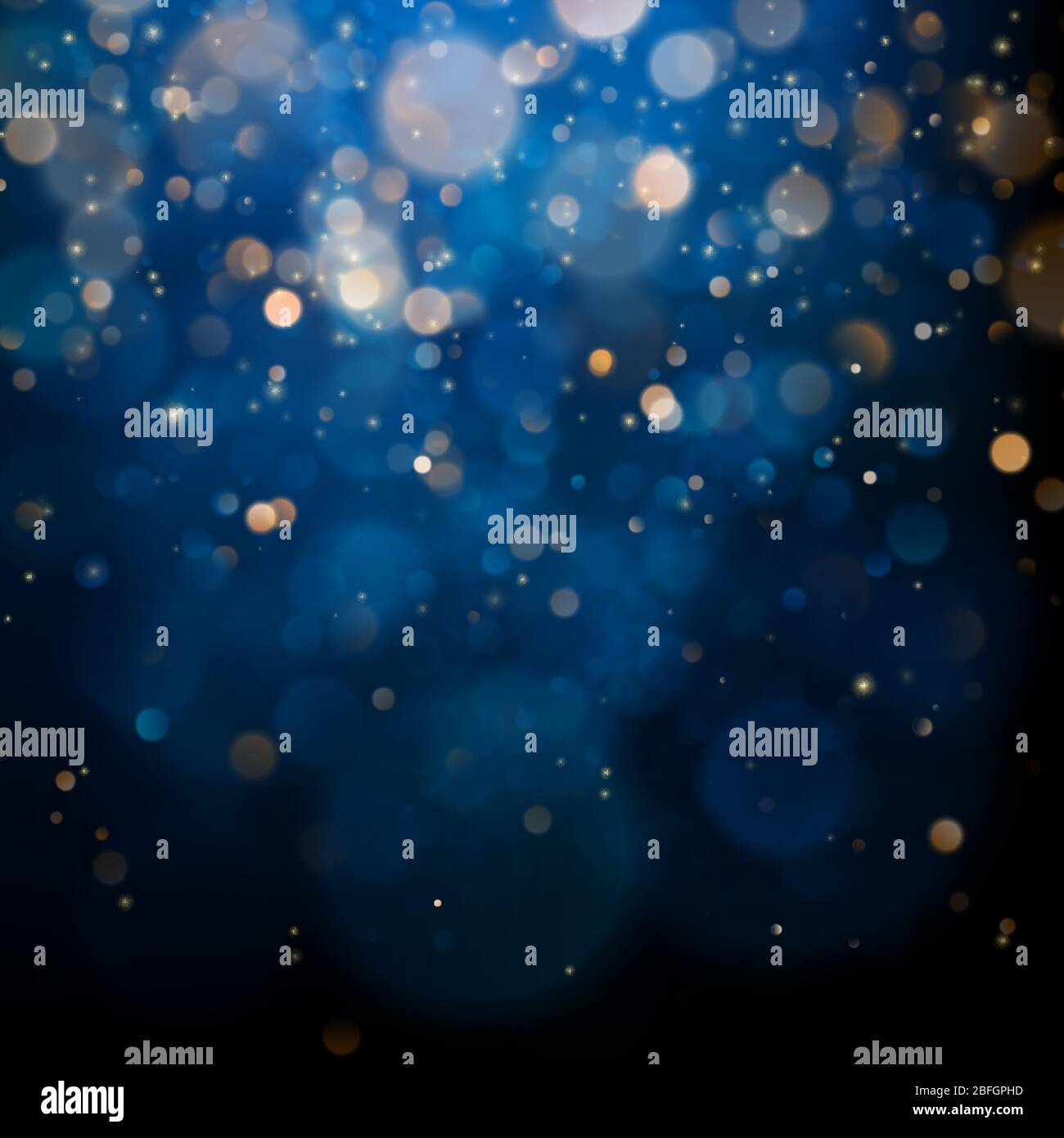 Blurred bokeh light on dark blue background. Christmas and New Year ...