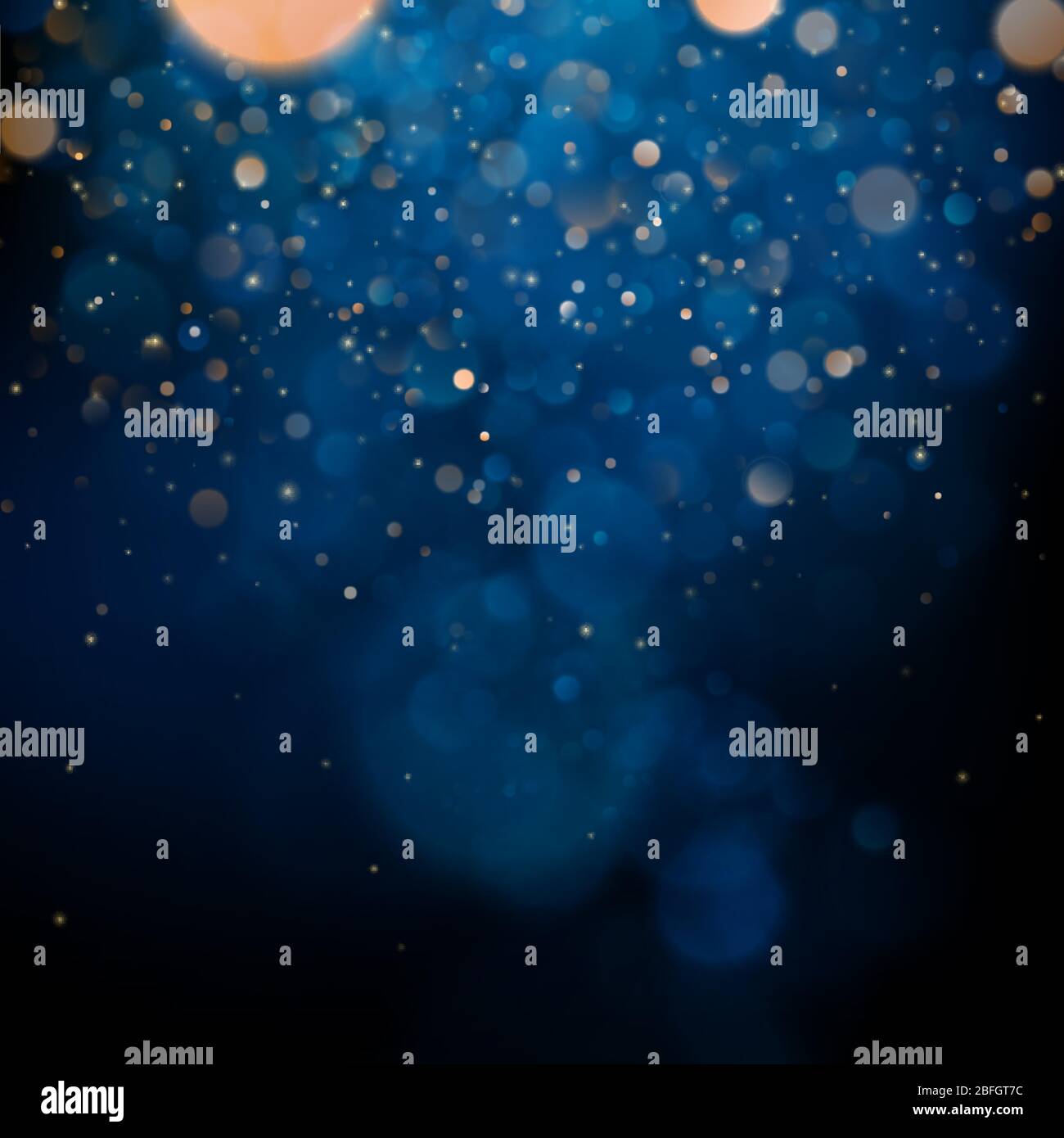 Blurred bokeh light on dark blue background. Christmas and New Year ...