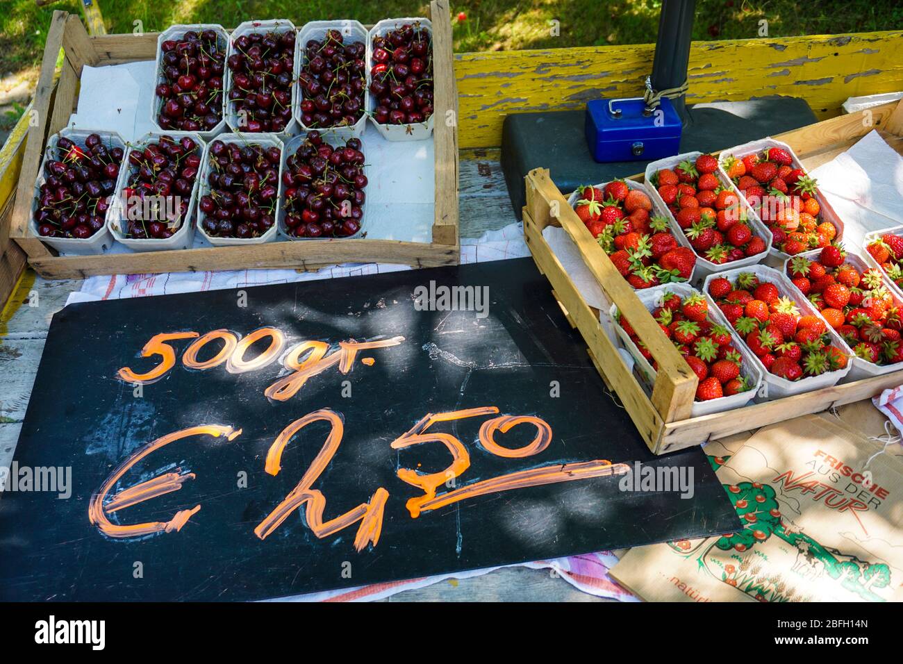 Cherry and strawberry basket for sale Stock Photo Alamy