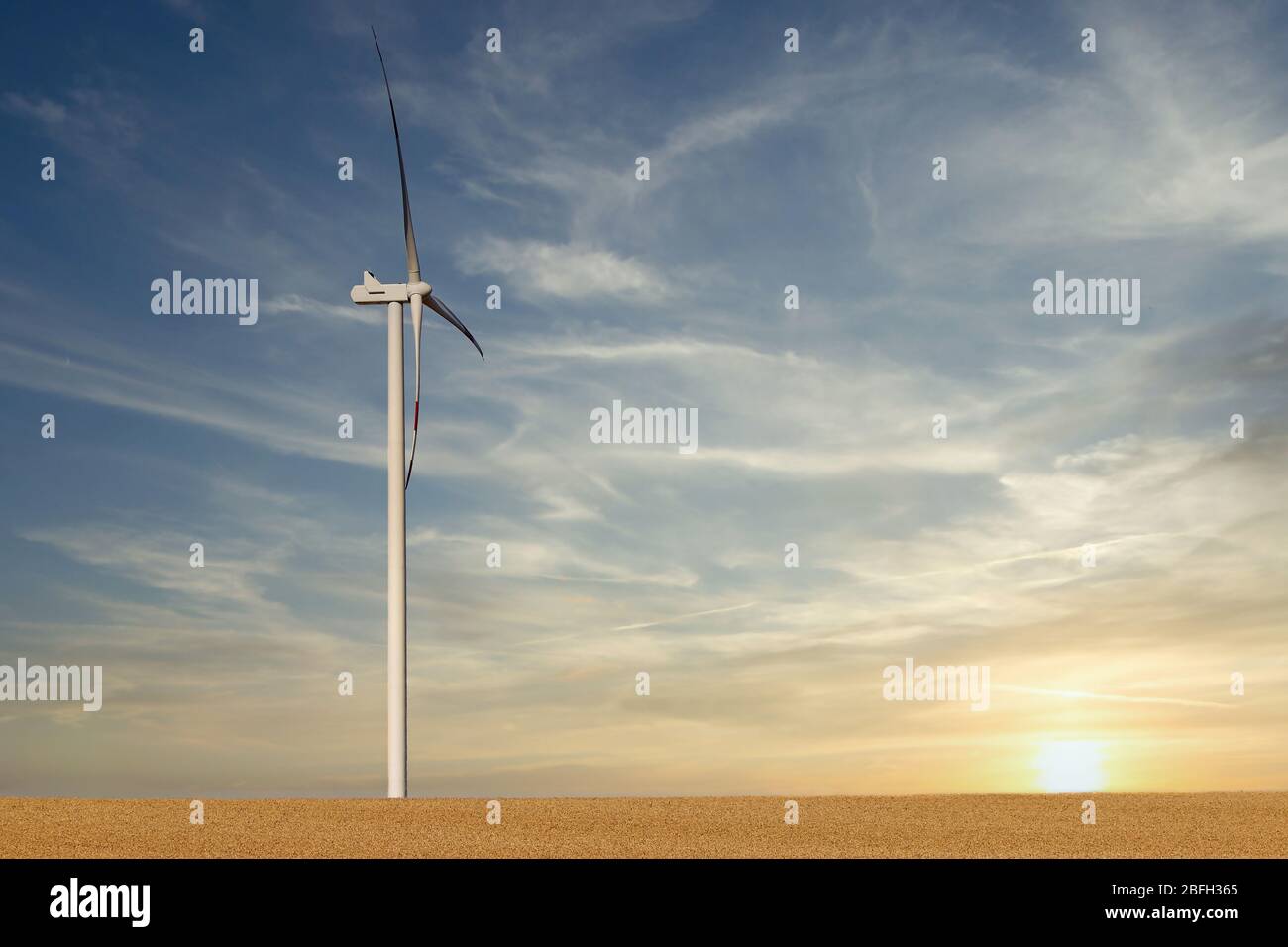 wind turbine in the wheat field sunset landscapes Stock Photo - Alamy