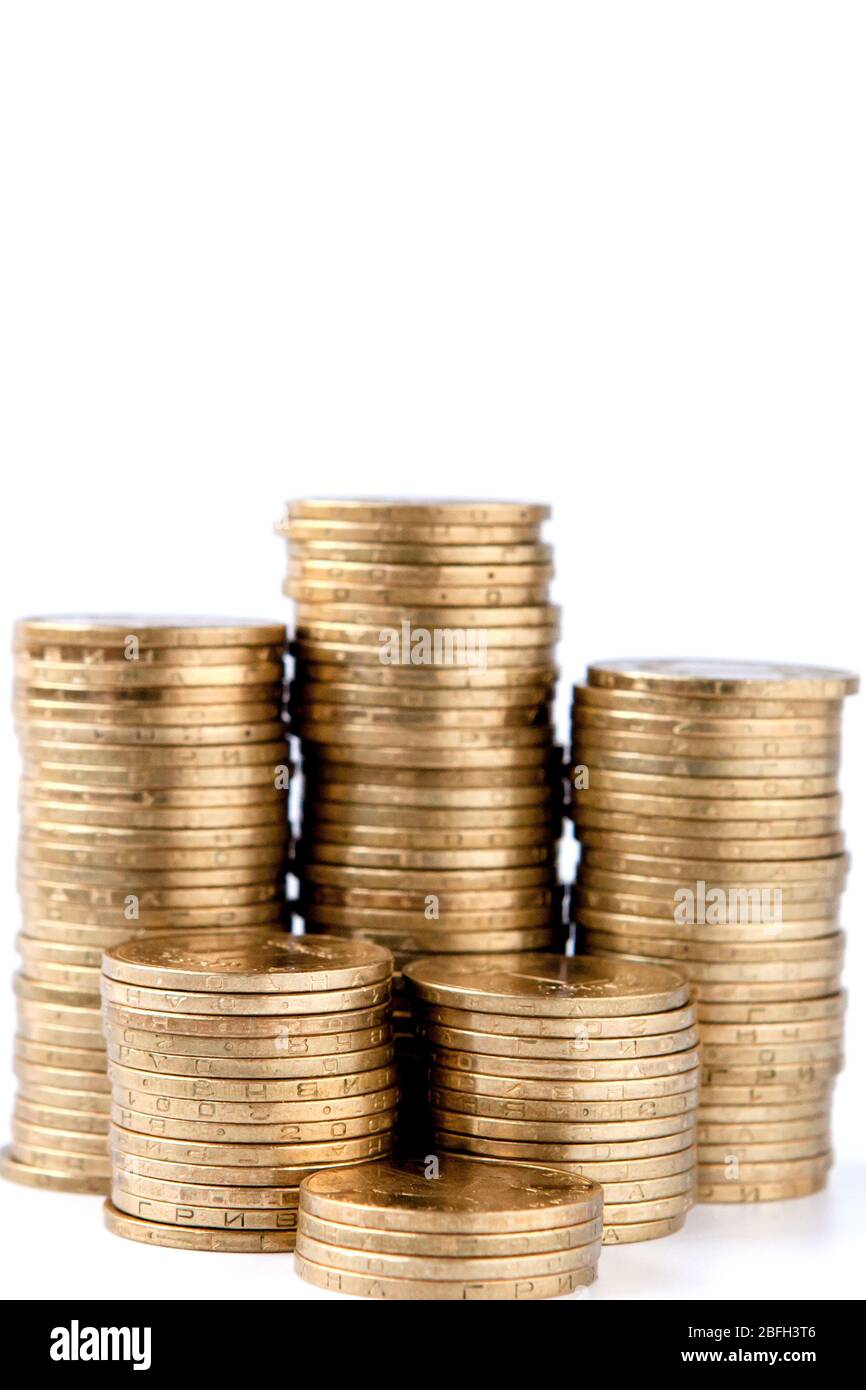 Stack of golden coins isolated on white background Stock Photo - Alamy