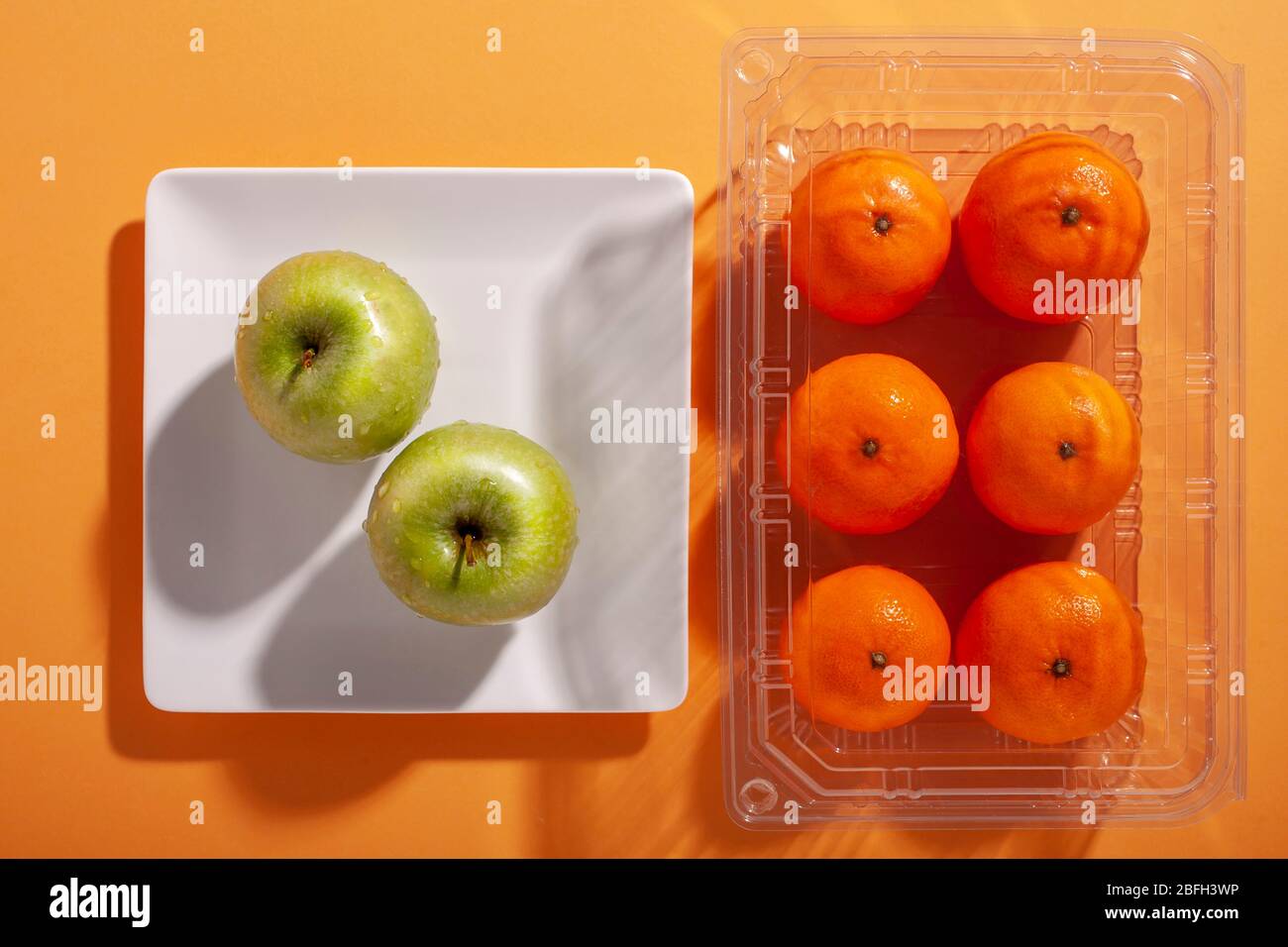 Oranges and apples from top view Stock Photo