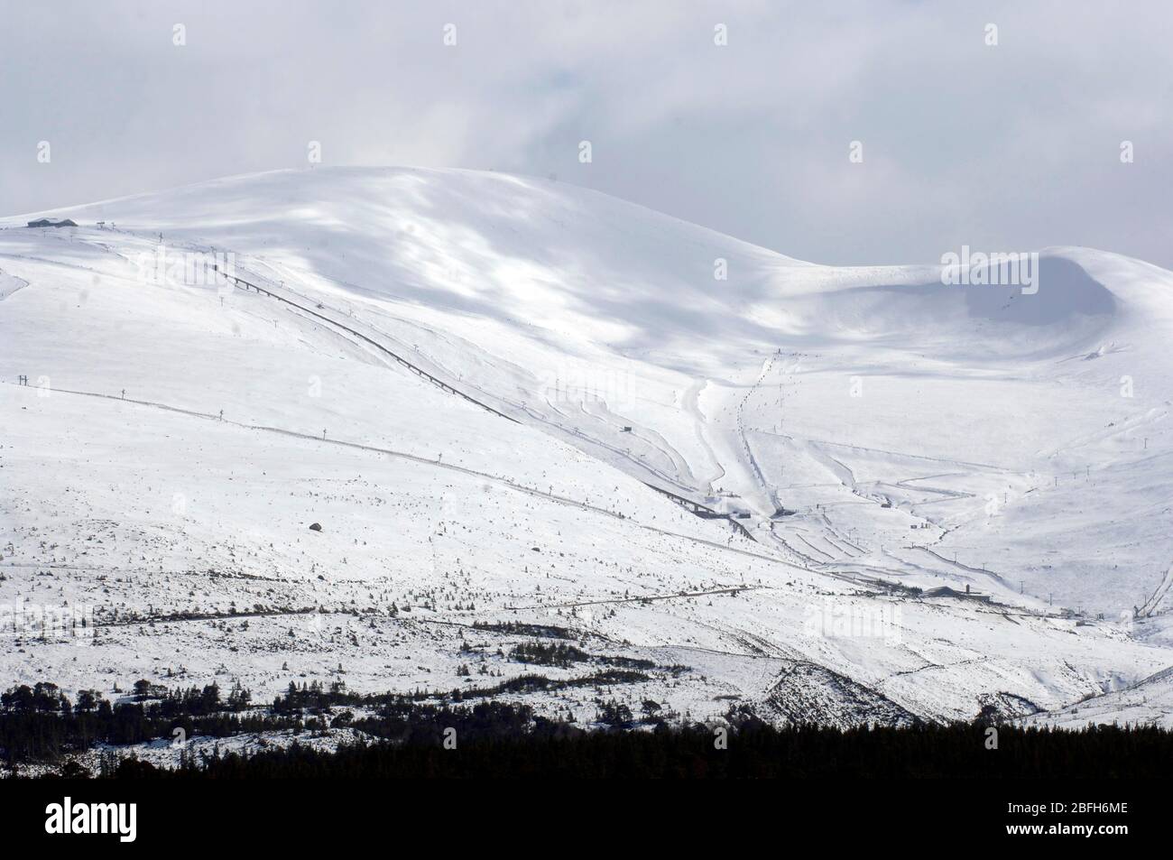 A view from Loch Morlich of the Cairngorm Mountain Ski Centre near Aviemore, Badenoch and Strathspey, Scotland. Stock Photo