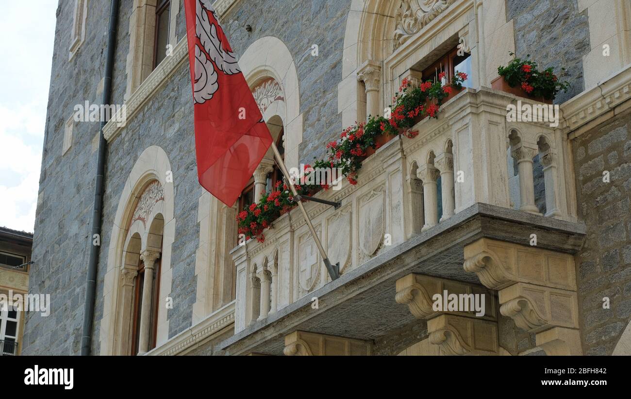 Flag at the balcony of the City Hall in Bellinzona, Canton Ticino. Stock Photo