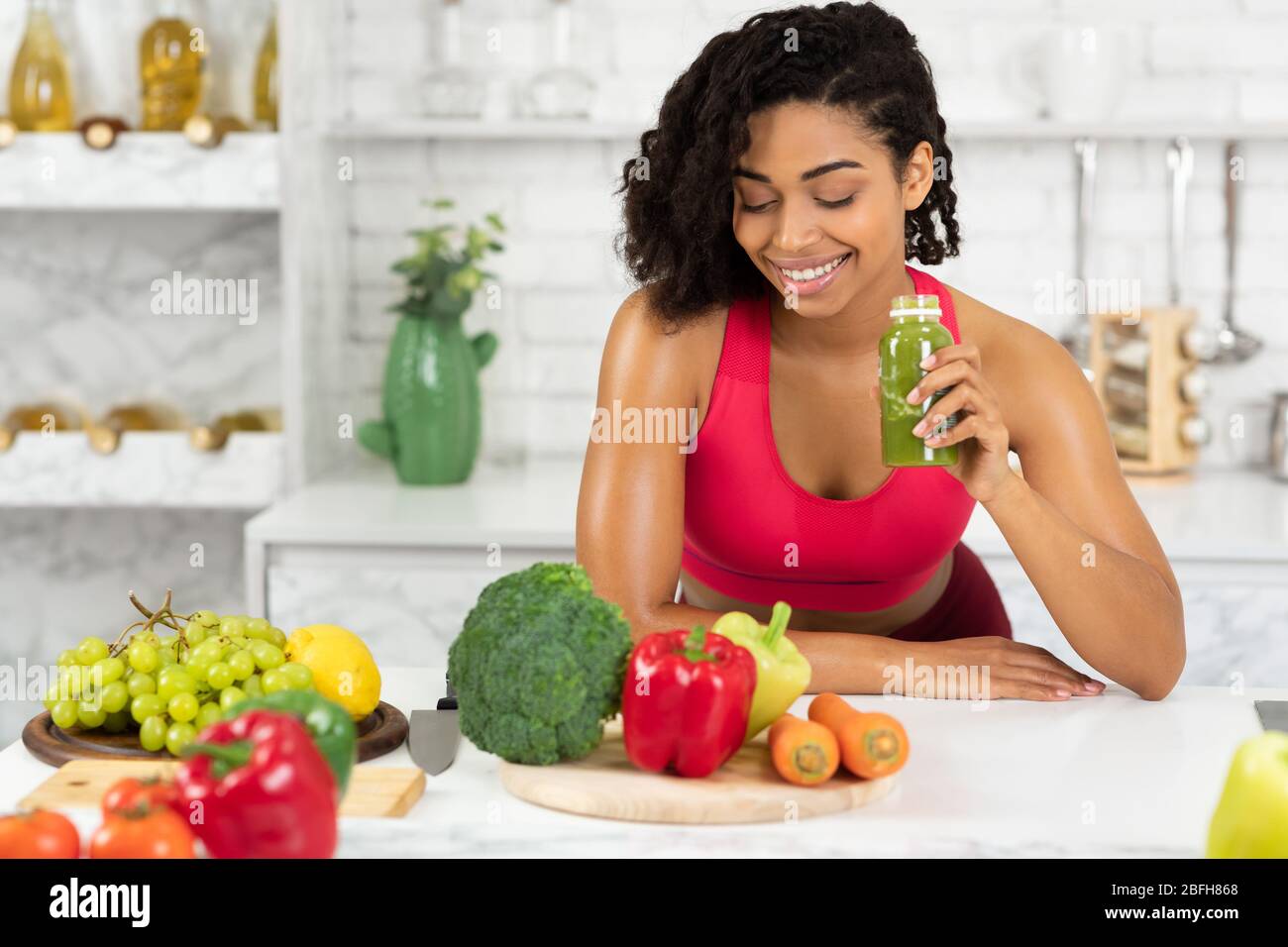 Fit Black Girl Drinking Delicious Green Detox Smoothie Stock Photo