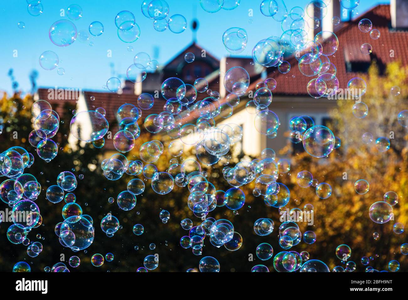 the rainbow bubbles from the bubble blower Stock Photo