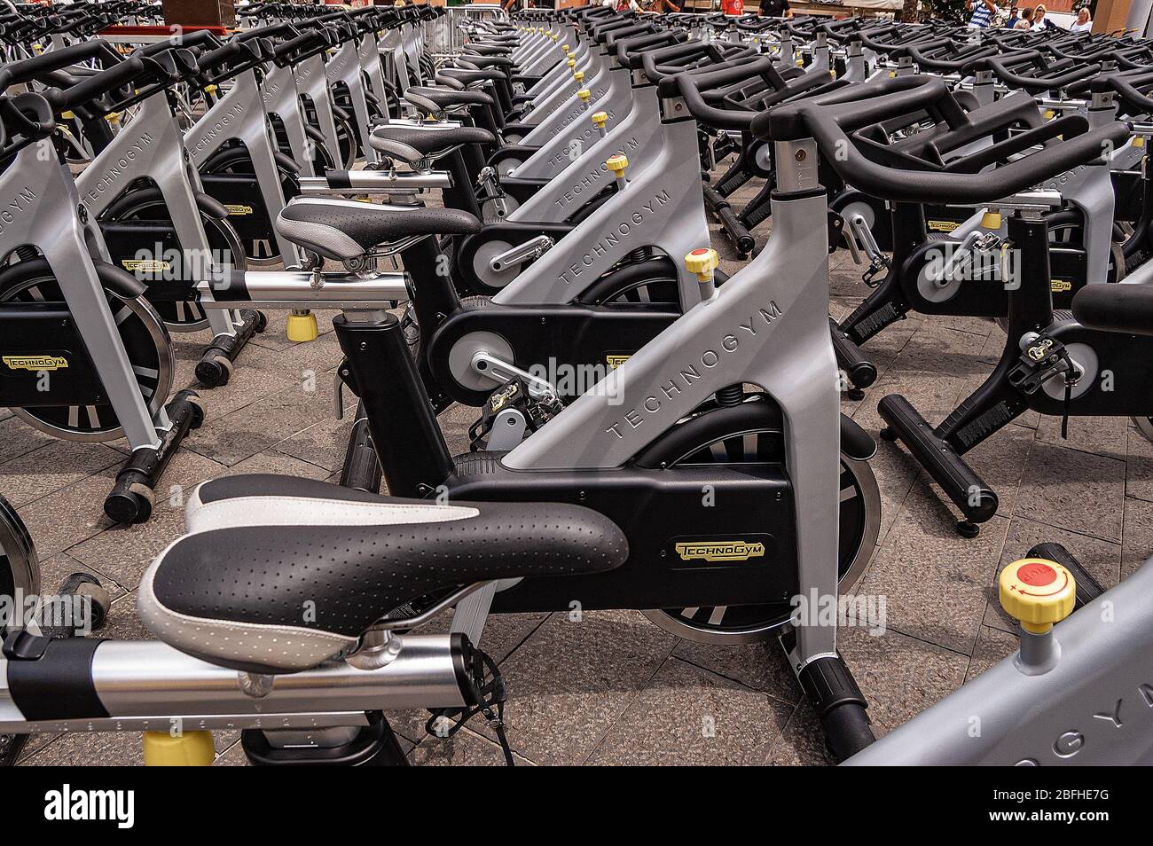 Large group of outdoor empty spinning bicycles of Technogym brand in the  central square of the small town of Lerici, La Spezia, Liguria, Italy,  Europe Stock Photo - Alamy