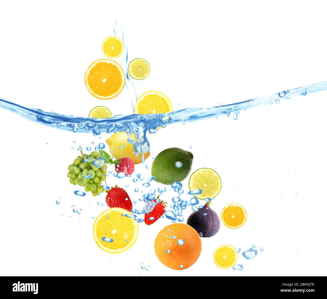 Fresh fruits dropped into water Stock Photo Alamy
