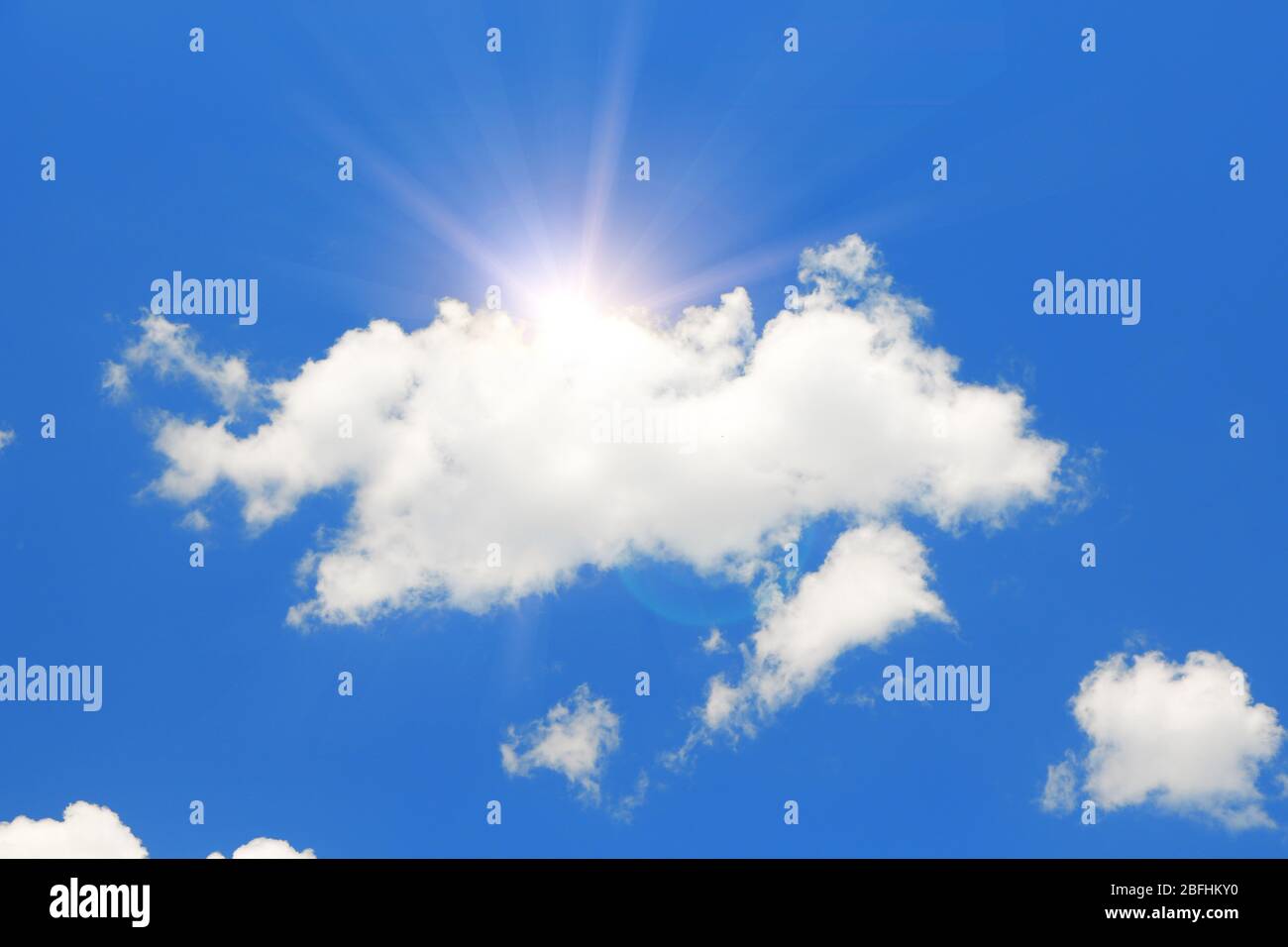 Blue sky with clouds and sun Stock Photo - Alamy