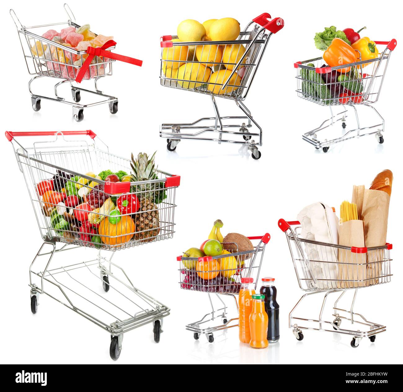 Trolleys with different products isolated on white Stock Photo