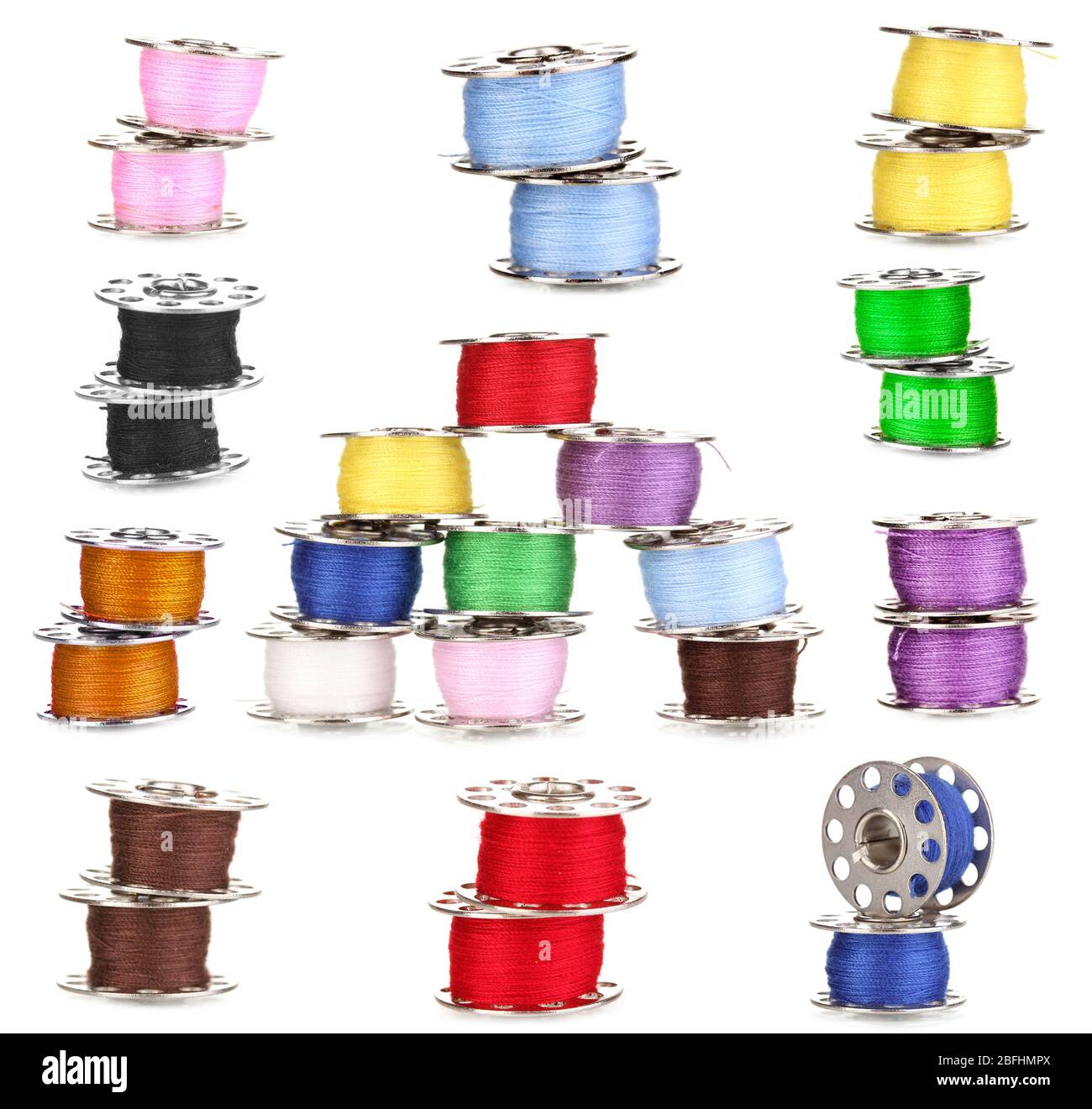 Collage of metal spools of thread isolated on white Stock Photo - Alamy