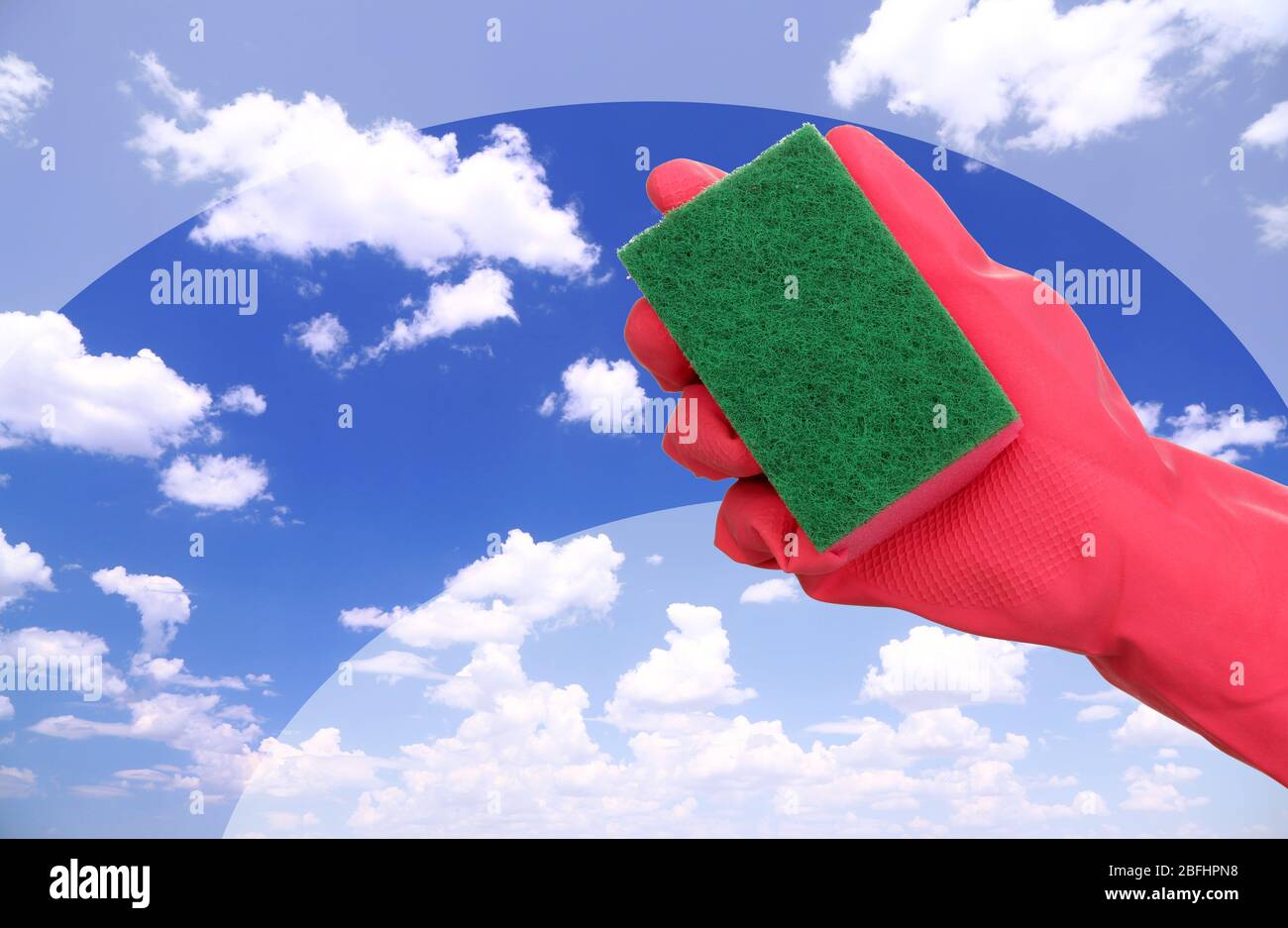 Hand with sponge cleaning dirty window Stock Photo Alamy