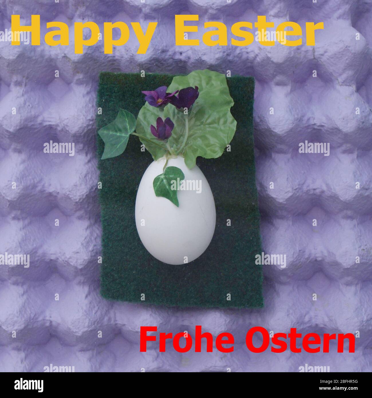 Deko Osterei mit Eierschachteln als Hintergrund Stock Photo