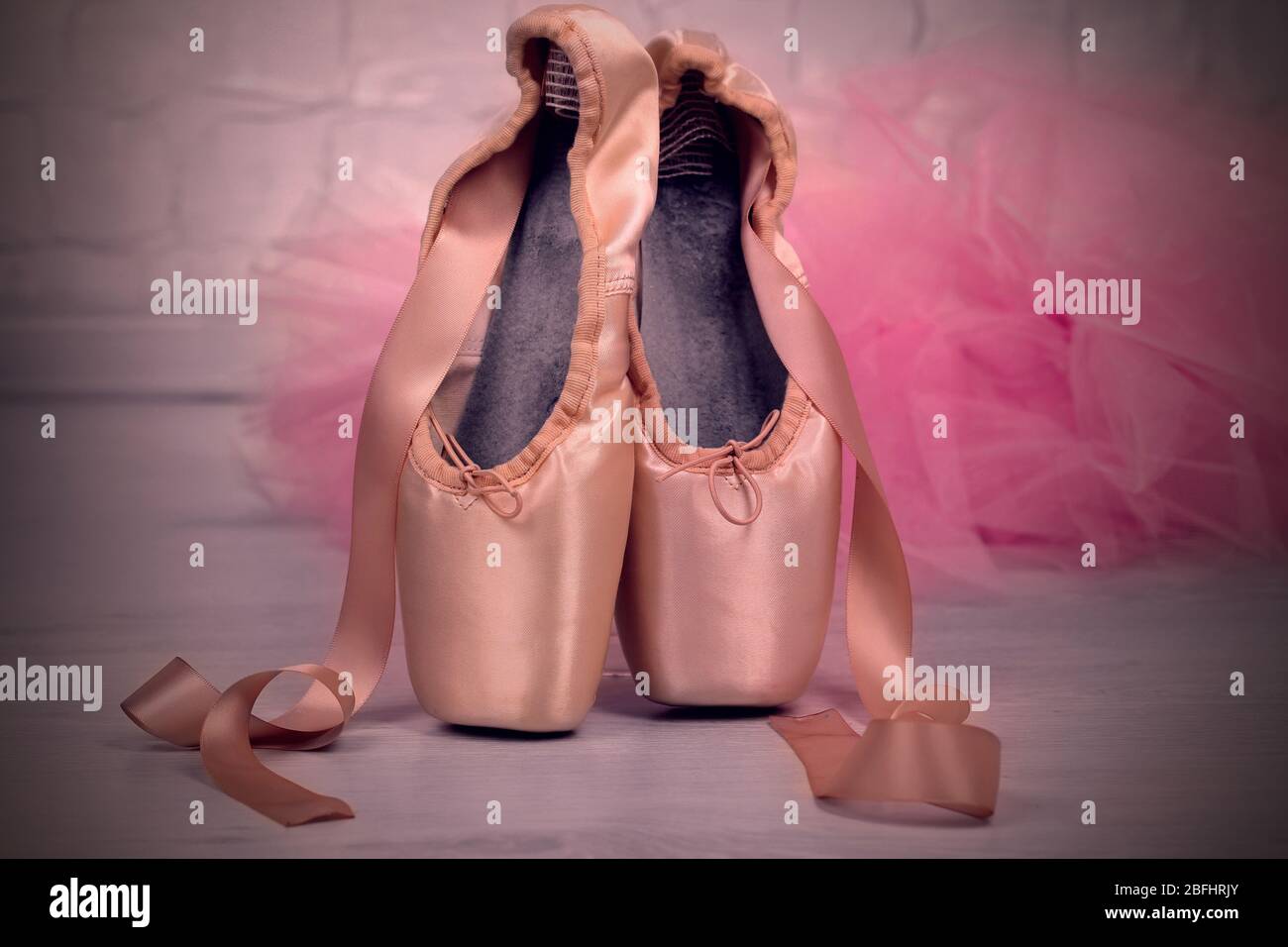 Ballet pointe shoes on floor Stock Photo Alamy