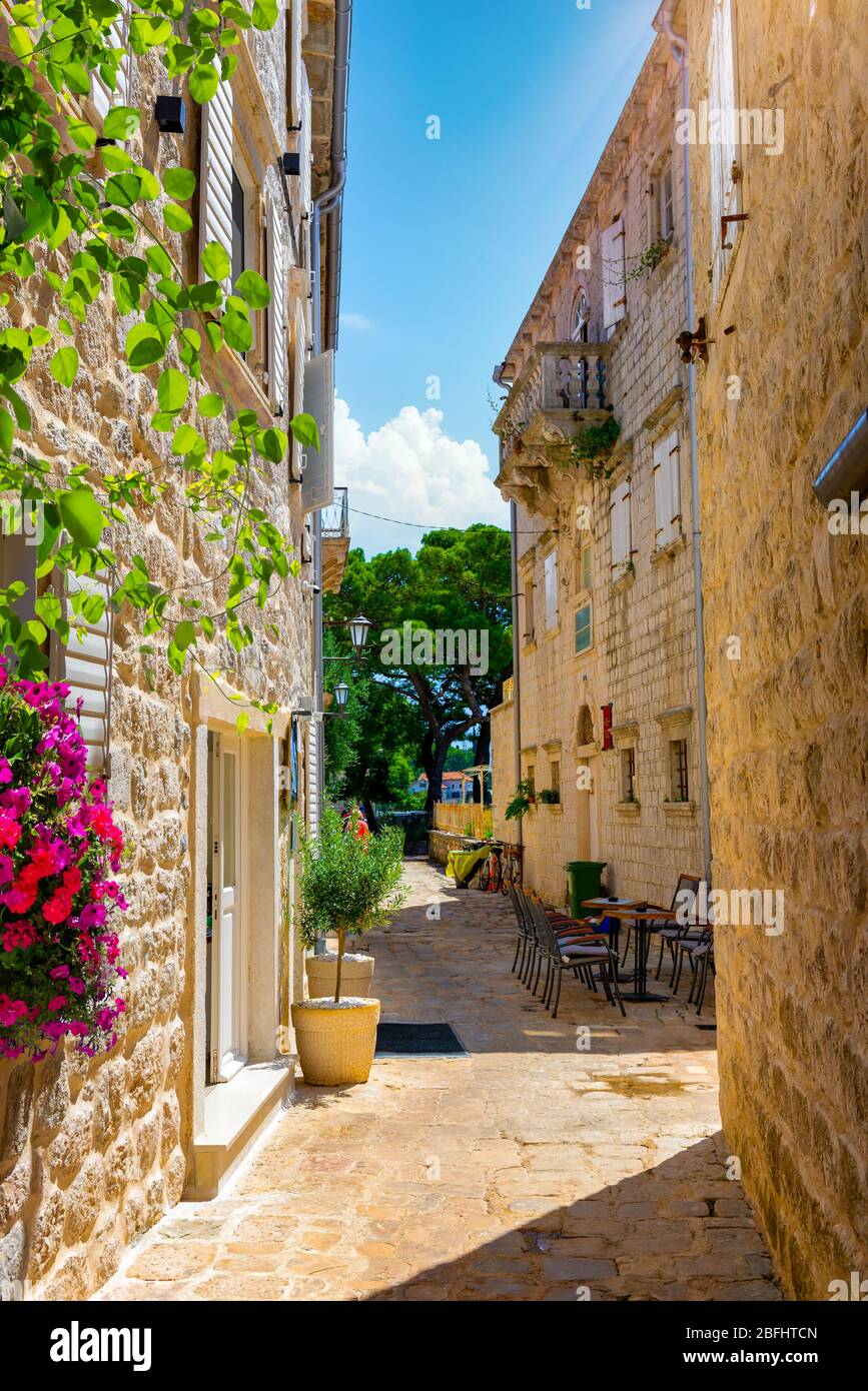 Narrow street in the old town of Perast, Montenegro Stock Photo